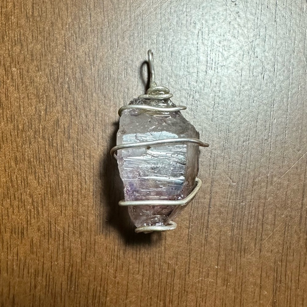 Super 7 Stone Wrapped in 925 Sterling Silver Wire..